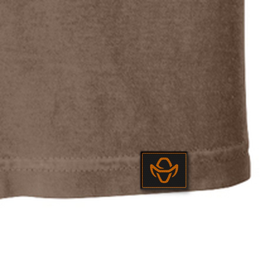 Woven Ranch Hand hat-mark hem tag sewn into the lower-left hem of a tee