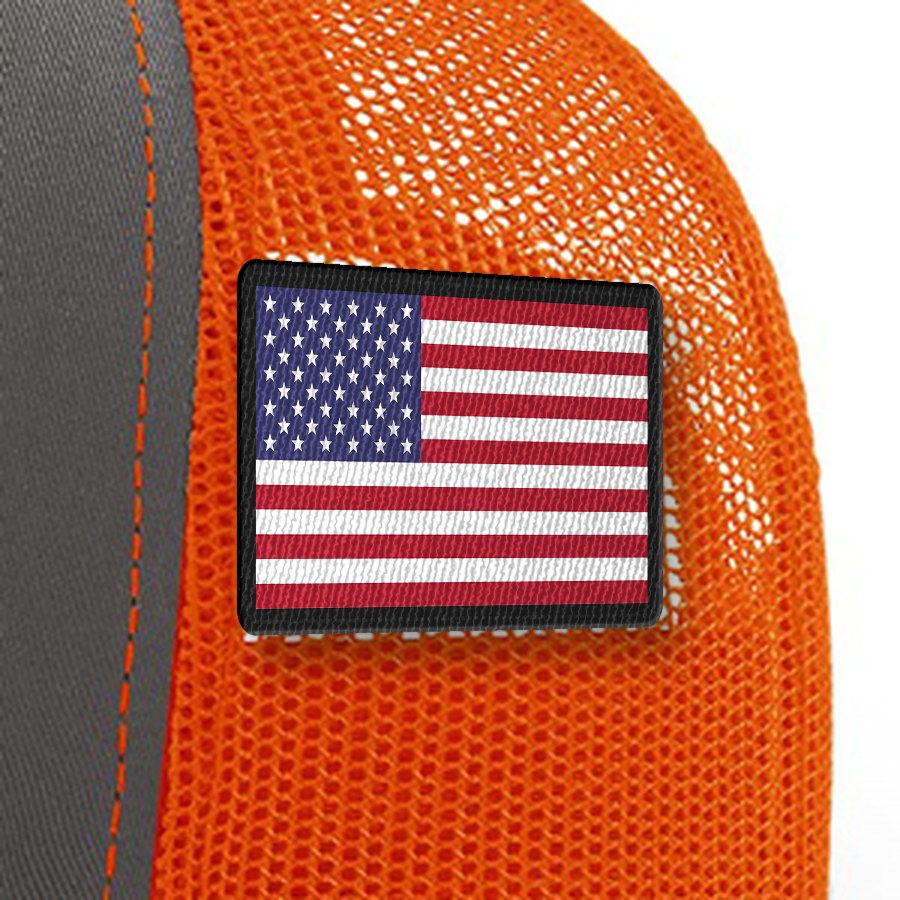 Ranch Hand Richardson 112 Trucker &mdash; Charcoal/Orange, mesh-side flag patch close-up