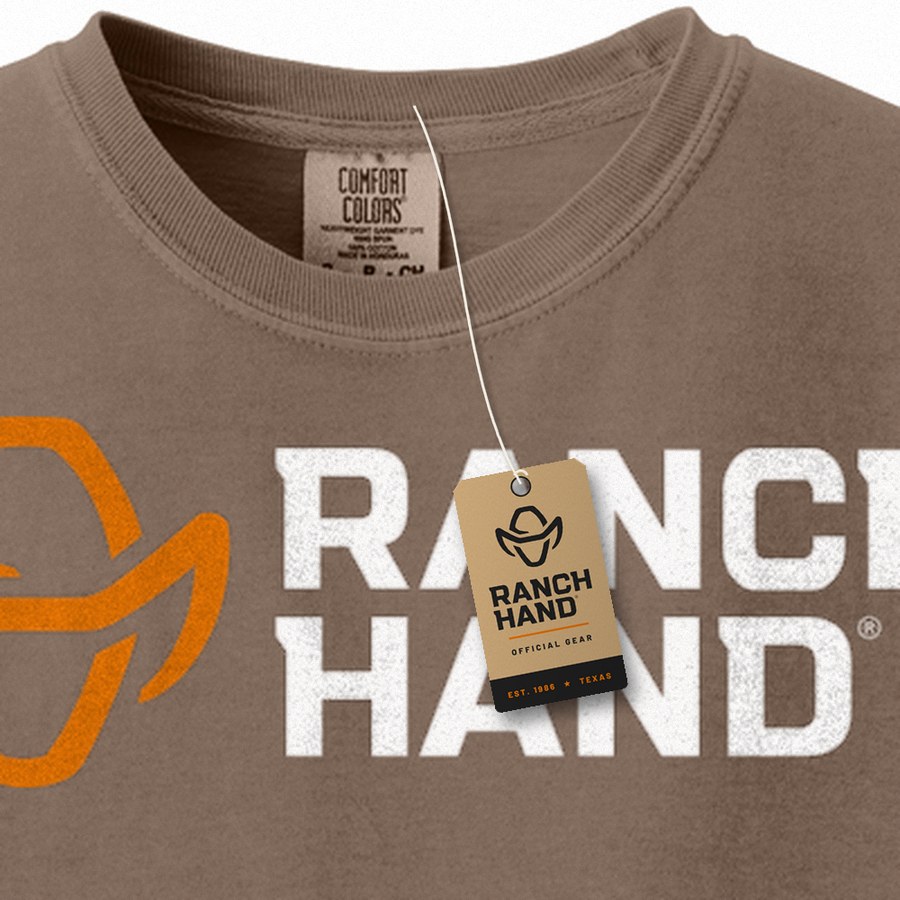 Kraft Ranch Hand hang tag hanging from the neck label of a Comfort Colors Espresso tee